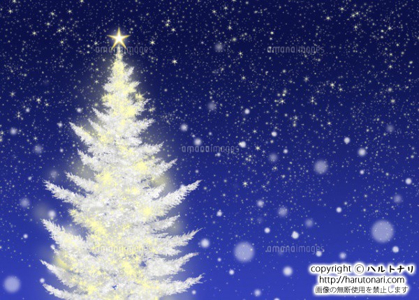 色々な色に光る白いクリスマスツリー