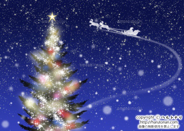 色々な色に光るクリスマスツリーとソリに乗ったサンタクロース